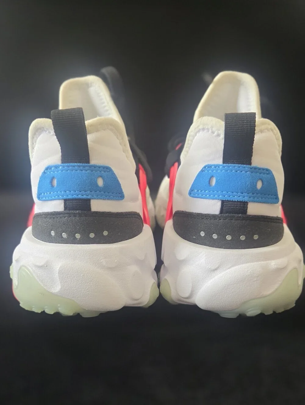 Nike White Athletic Shoes with Coral and Blue Accents